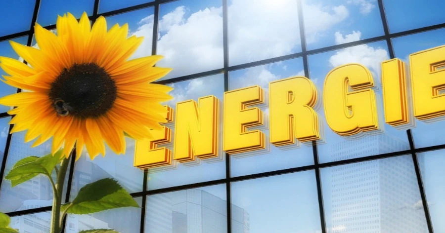 Tournesol éclatant devant le mot 'énergie' inscrit sur le haut d'un building, symbolisant le regain de vitalité